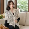 A white crochet lace shawl for ladies in summer, a thin, elegant and versatile handcrafted lace decoration details Picture